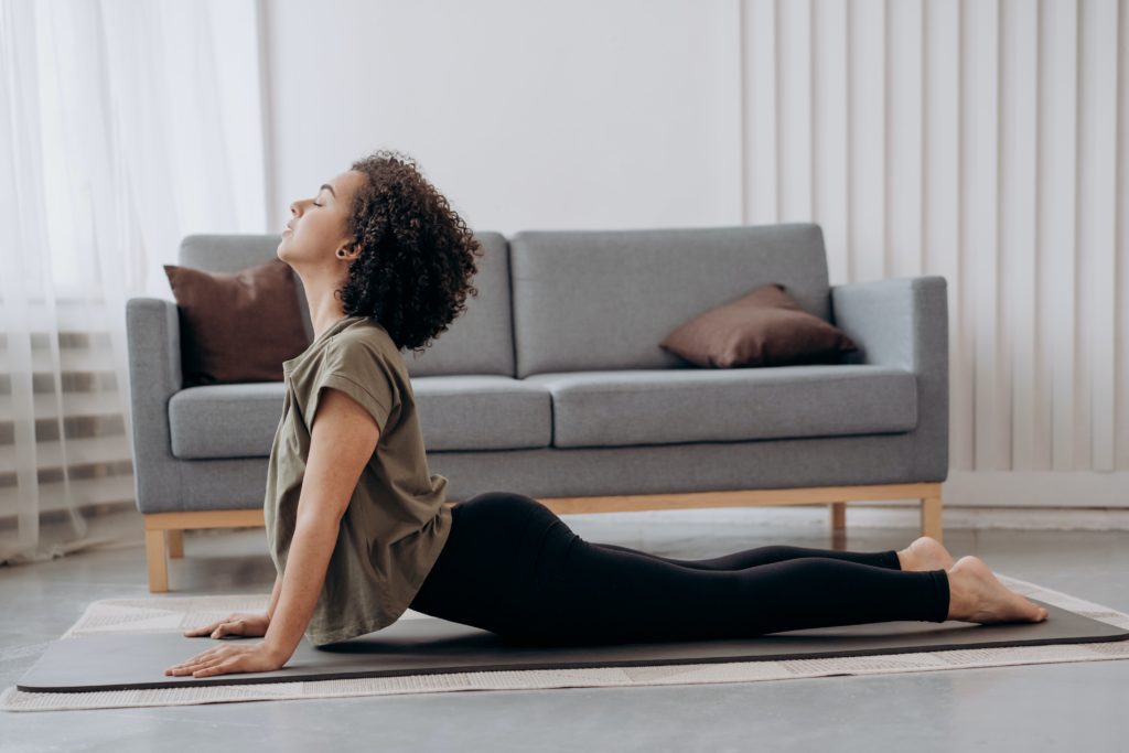 A women performing stretching exercise.